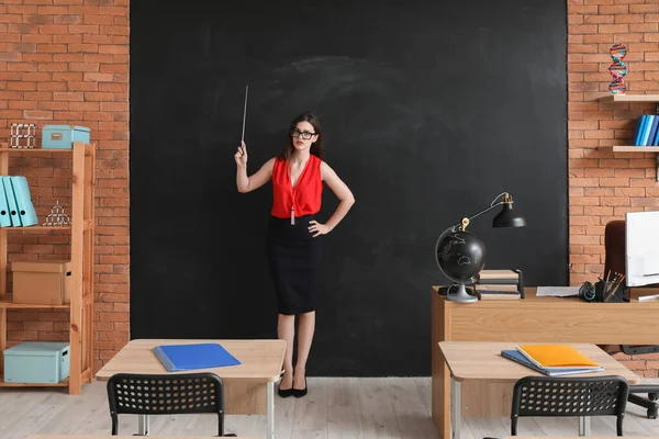Female Teacher Pointer Blackboard Classroom — Stock Photo, Image