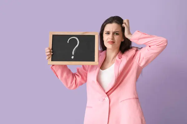 Stressed Female Teacher Holding Chalkboard Question Mark Lilac Background — Stock Photo, Image