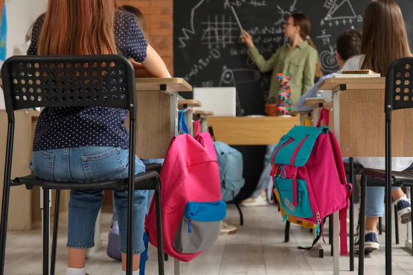 Little Pupils Backpacks Having Lesson Classroom Back View — Stock Photo, Image