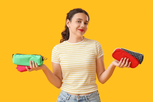 Female Student Pencil Cases Yellow Background — Stock Photo, Image