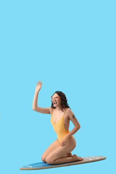 Young Woman Swimsuit Surfboard Blue Background — Stock Photo, Image