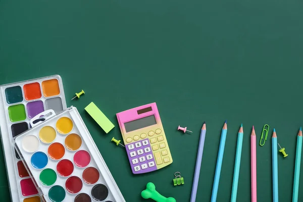 Different Stationery Calculator Green Chalkboard — Stock Photo, Image
