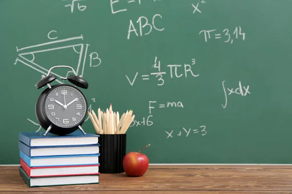 Stationery Alarm Clock Fresh Apple Wooden Table Green Chalkboard Formulas — Stock Photo, Image