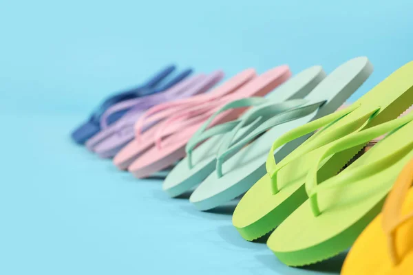Many Different Flip Flops Blue Background — Stock Photo, Image