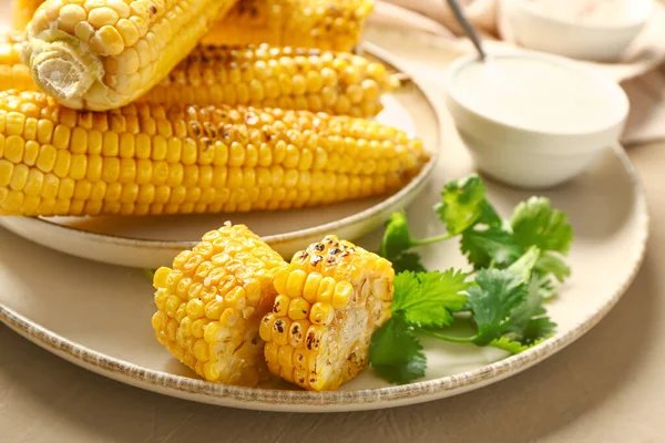 Plate Tasty Grilled Corn Cobs Sauce Brown Background — Stock Photo, Image