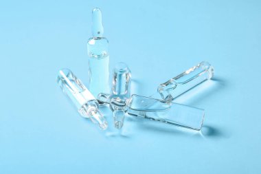 mavi arka plan üzerinde tıbbi ampul