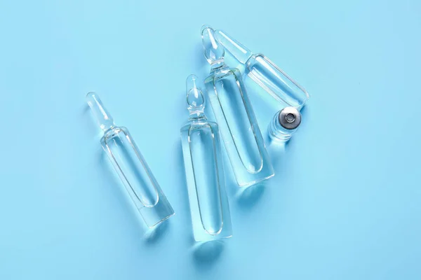 Ampollas Médicas Sobre Fondo Azul —  Fotos de Stock