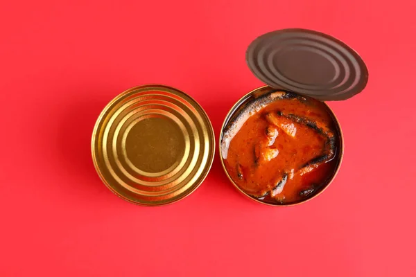 Tin Cans Fish Tomato Sauce Red Background — Stock Photo, Image