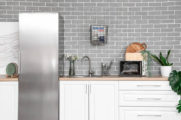 Interior Kitchen Stylish Fridge Counters Microwave Oven Houseplants — Stock Photo, Image