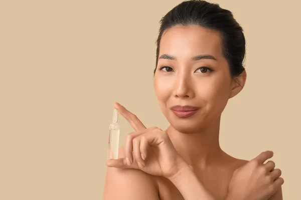 Beautiful Asian Woman Ampule Beige Background Skin Care Concept — Stock Photo, Image