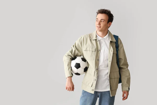Male Student Backpack Soccer Ball Grey Background — Stock Photo, Image