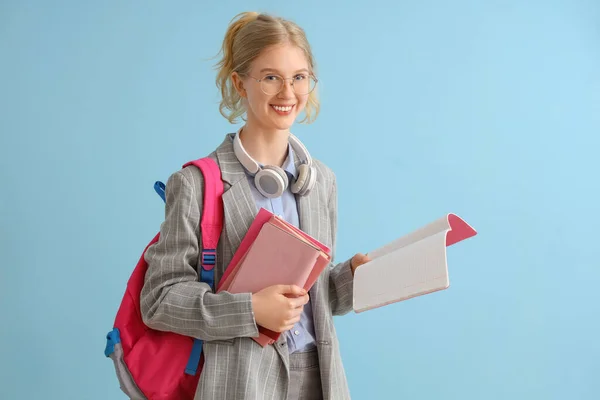 Happy Female Student Backpack Books Headphones Blue Background — Stock Photo, Image