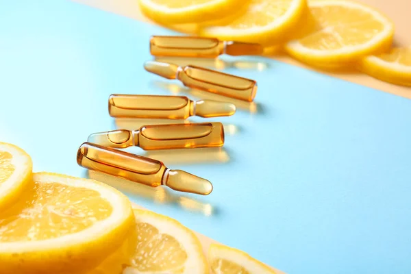 Ampoules Vitamin Lemon Slices Colorful Background Closeup — Stock Photo, Image