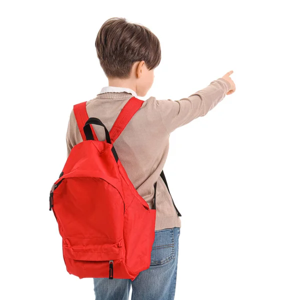 Kleiner Junge Mit Schultasche Zeigt Auf Etwas Auf Weißem Hintergrund — Stockfoto