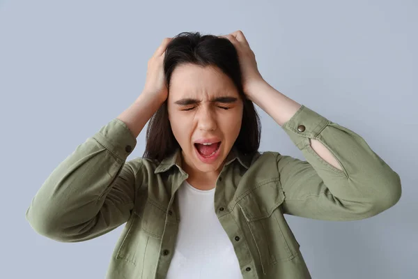 Young Woman Having Panic Attack Light Background — Stock Photo, Image