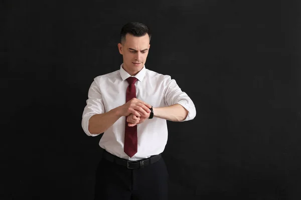 Male Teacher Looking Wristwatch Blackboard Classroom — Stock Photo, Image