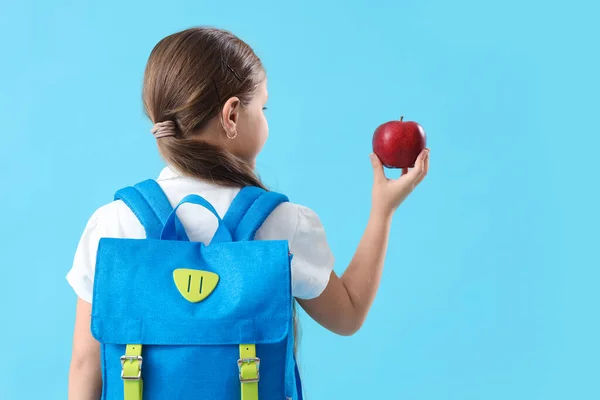 Little Schoolgirl Backpack Apple Light Blue Background Back View — Stock Photo, Image