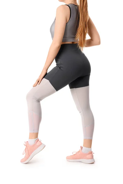 Beyaz Arka Planda Spor Giyimli Genç Bir Kadın — Stok fotoğraf
