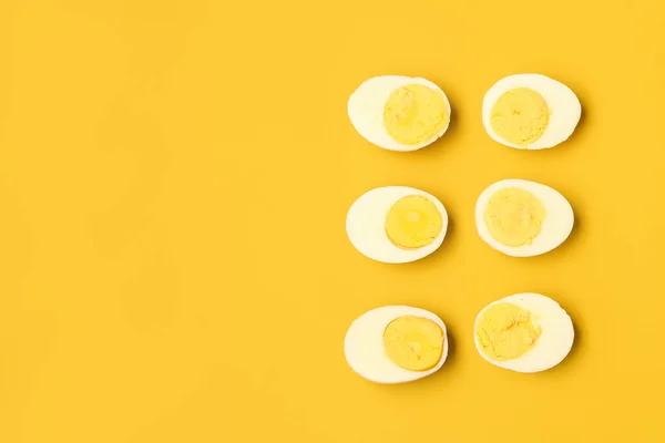 Halves Tasty Boiled Eggs Yellow Background — Stock Photo, Image