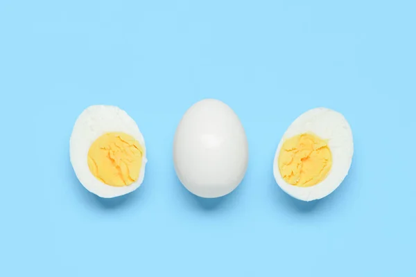 Tasty Boiled Egg Halves Blue Background — Stock Photo, Image