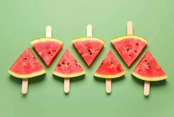 stock image Sweet watermelon sticks on green background