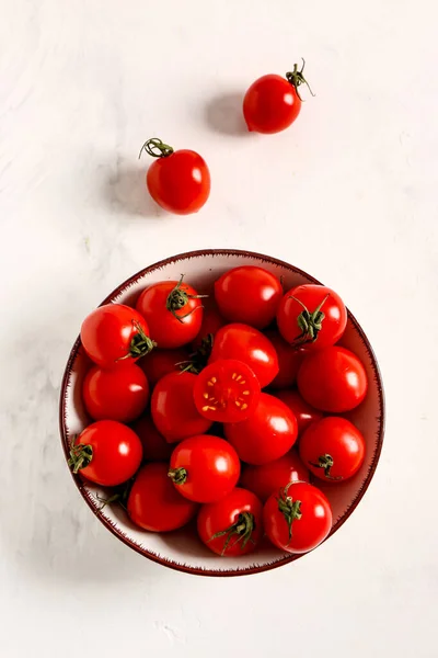 stock image Bowl with fresh cherry tomatoes on white background