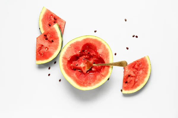 stock image Half of fresh watermelon with pieces and seeds on white background