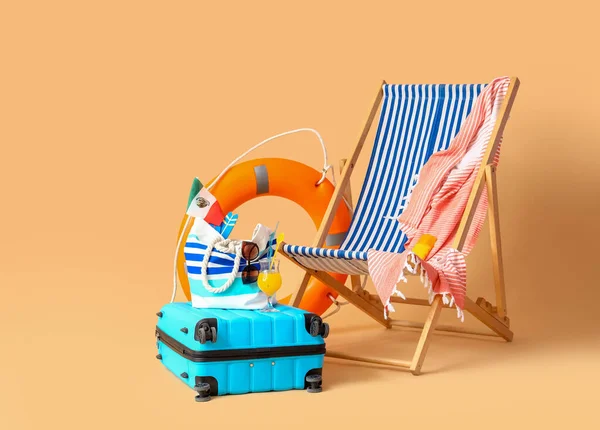 Deckchair Suitcase Ring Buoy Beach Accessories Beige Background Travel Concept — Stock Photo, Image