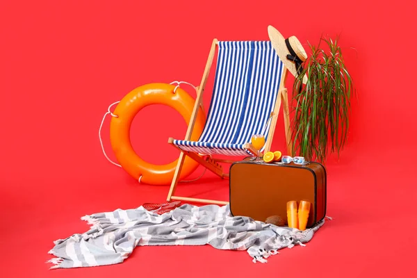 Deckchair Suitcase Ring Buoy Different Beach Accessories Red Background Travel — Stock Photo, Image