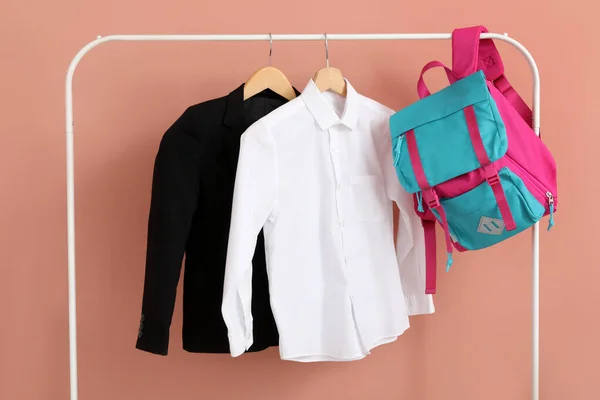 Rack Stylish School Uniform Backpack Beige Wall Room — Stock Photo, Image