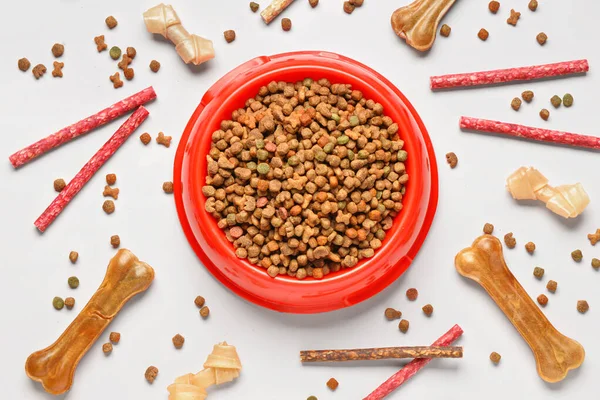 Composition Bowl Dry Dog Food Different Treats Light Background — Stock Photo, Image