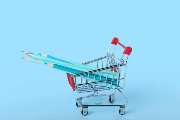 Shopping Cart Pencils Blue Background — Stock Photo, Image