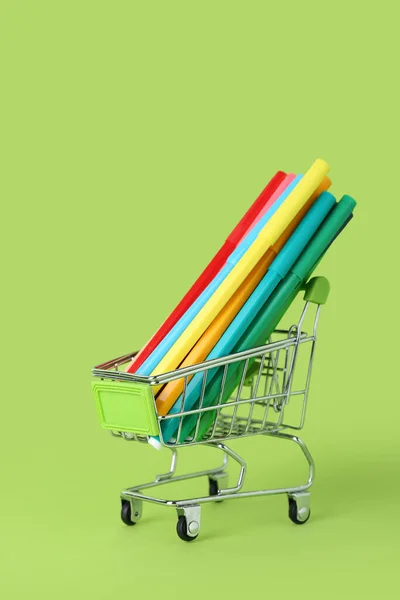 Shopping Cart Pencils Green Background — Stock Photo, Image