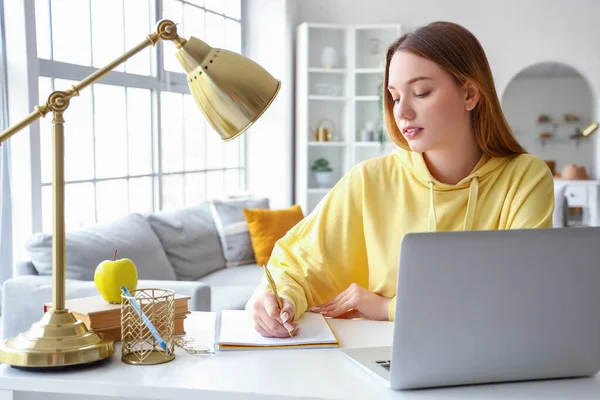 Female Student Writing Notebook Home — Stock Photo, Image
