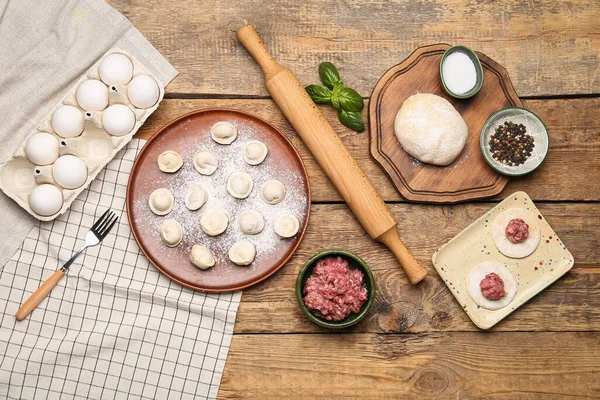 Plate Uncooked Dumplings Ingredients Wooden Background — Stock Photo, Image