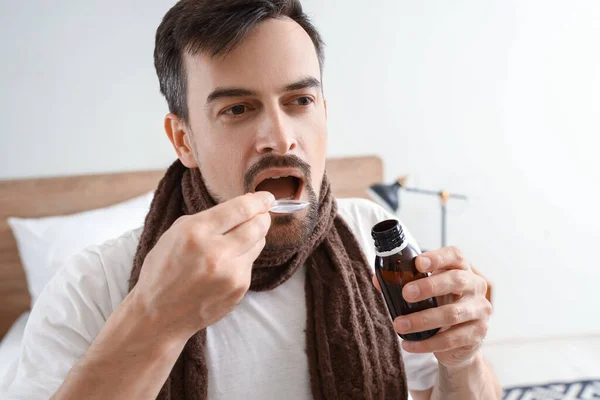 Ill Young Man Taking Cough Syrup Bedroom Closeup — Stock Photo, Image