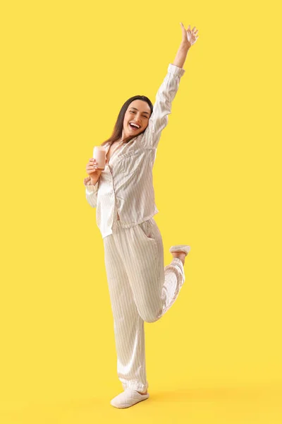 Young Woman Pajamas Tasty Yoghurt Yellow Background — Stock Photo, Image