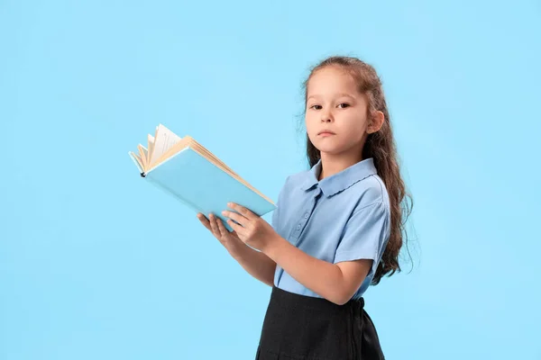 Little Schoolgirl Book Light Blue Background — Stock Photo, Image