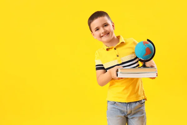 Little Schoolboy Books Globe Yellow Background — Stock Photo, Image