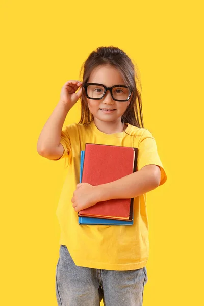 Little Schoolgirl Books Yellow Background — Stock Photo, Image