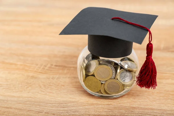 Jar Coins Graduation Cap Wooden Background Student Loan Concept — Stock Photo, Image
