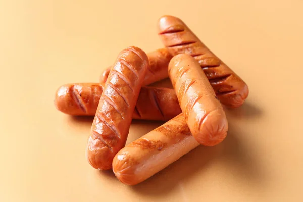 Tasty Grilled Sausages Orange Background — Stock Photo, Image