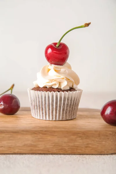Wooden Board Tasty Cherry Cupcake Light Background Royalty Free Stock Photos