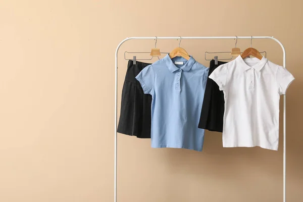 Rack Stylish School Uniform Color Background — Stock Photo, Image