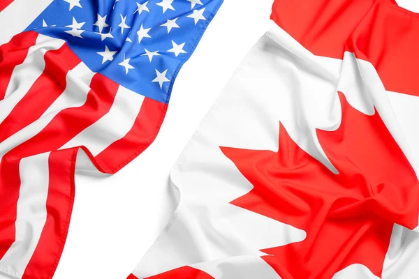 在白色背景下的加拿大和美国国旗 — 图库照片