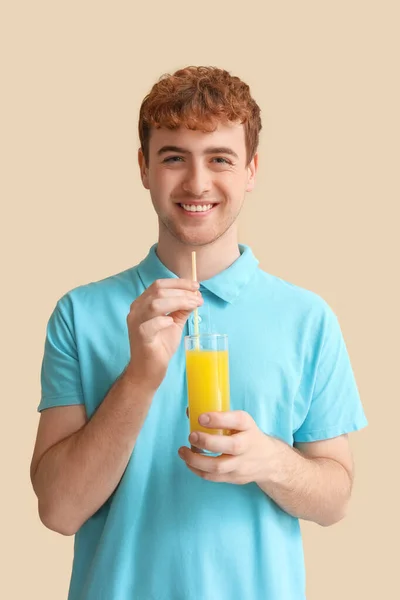 Young Man Glass Orange Juice Beige Background — Stock Photo, Image