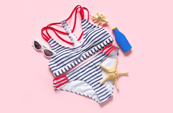 Stylish Swimsuit Sunglasses Sunscreen Cream Starfish Pink Background — Stock Photo, Image