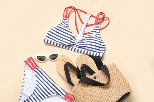 Stylish Swimsuit Bag Flip Flops Sunglasses Color Background — Stock Photo, Image
