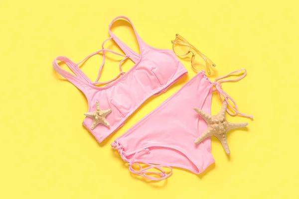 Stylish Swimsuit Starfishes Yellow Background — Stock Photo, Image