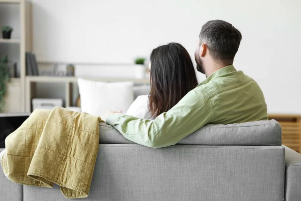 Happy Young Couple Resting Sofa Home Back View — Stock Photo, Image